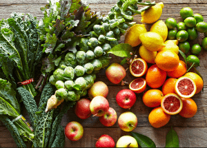a group of fruits and vegetables on a wood surface Healthy Weight Loss Diets Stevenage Ware